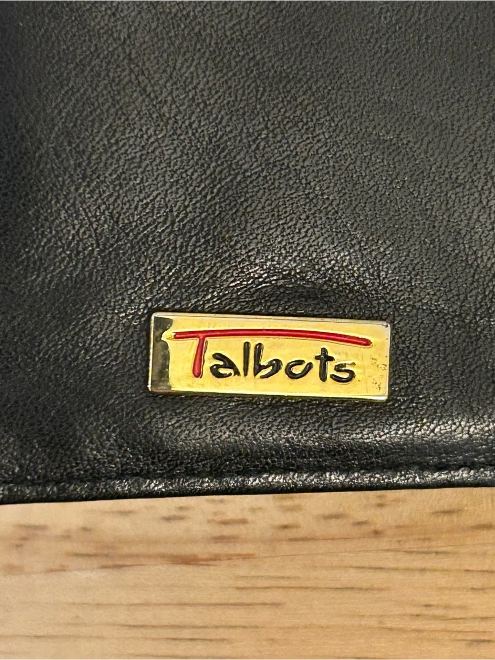 Vintage smooth black leather bifold wallet from Talbot